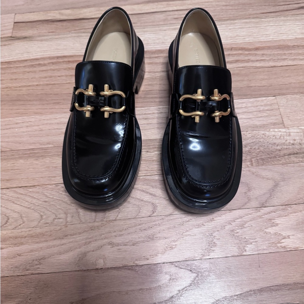 Bottega Black Leather Loafers with Gold Accent